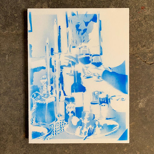 Abstract blue and white artwork on a textured brown surface