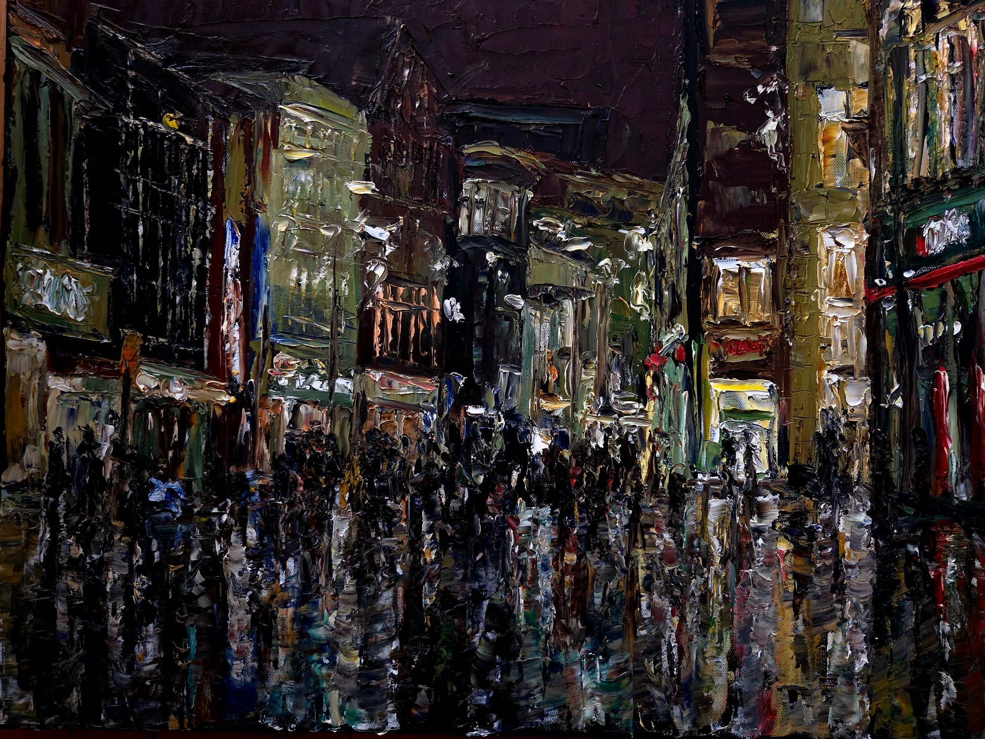 Painting of a crowded city street at night with illuminated buildings.
