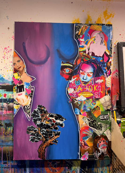 Colorful abstract artwork with various elements on a wall.