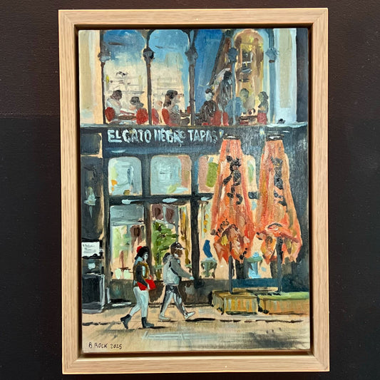 Lively evening painting of the El Gato Negro Tapas restaurant on King Street, Manchester, featuring figures passing by, available at HEADS Art Gallery.