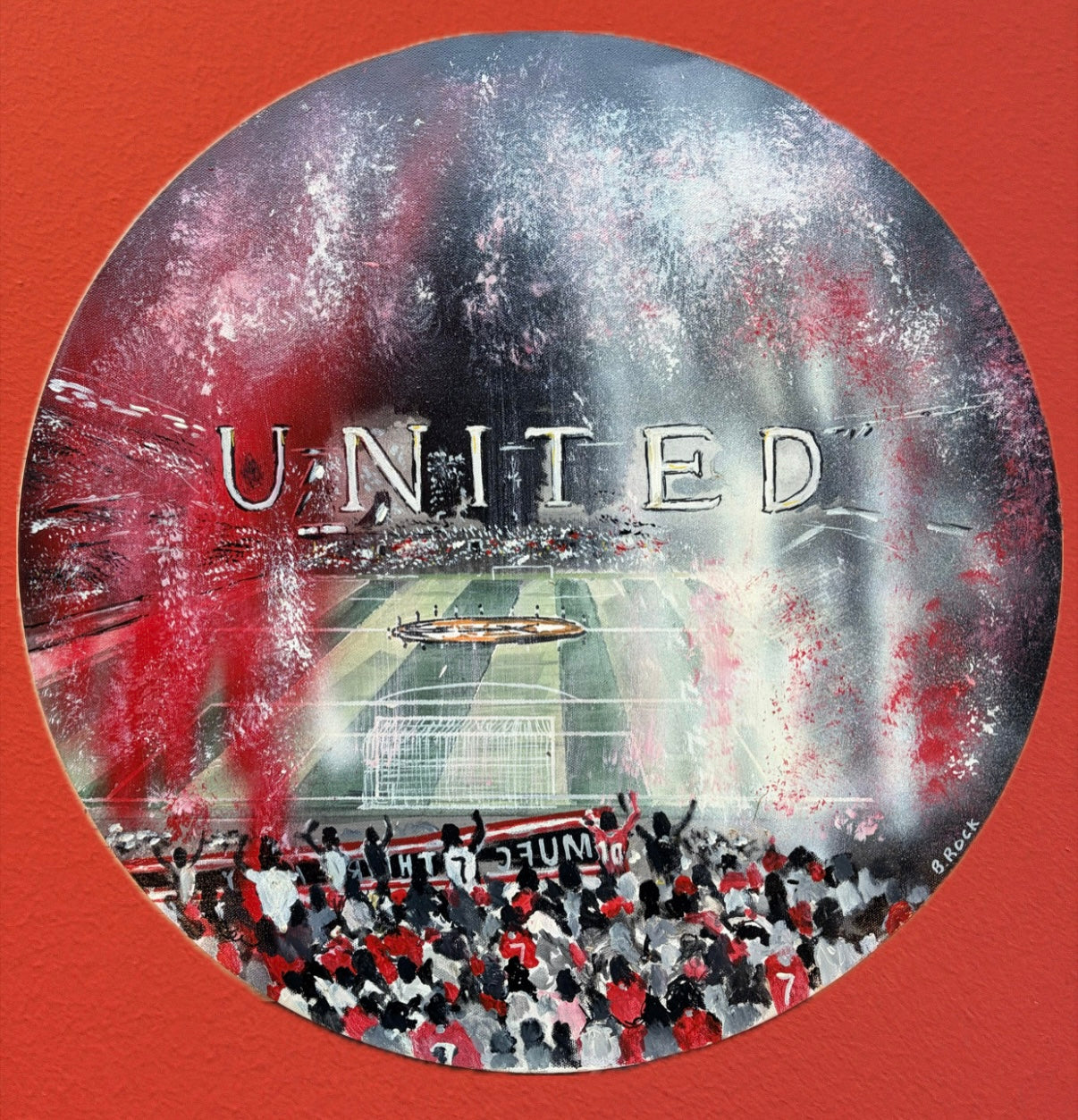 Circular painting depicting a packed football stadium with "UNITED" text and red flares among the fans at Old Trafford, available at HEADS Art Gallery.