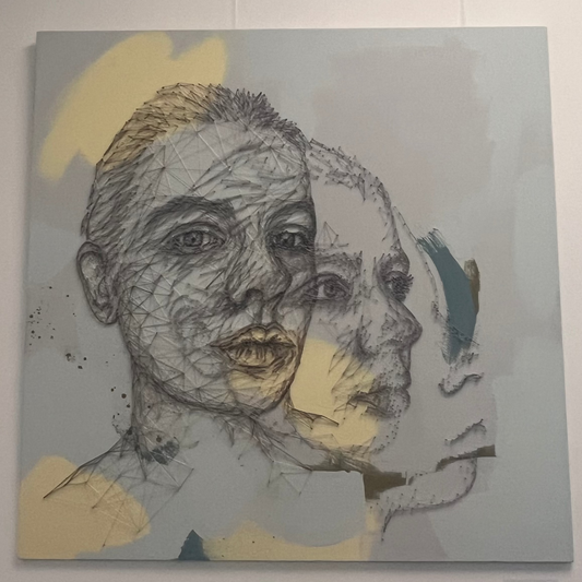 String art on a light grey canvas using fine threads to create a layered, multiple-exposure portrait effect of a human face, available at HEADS Art Gallery.