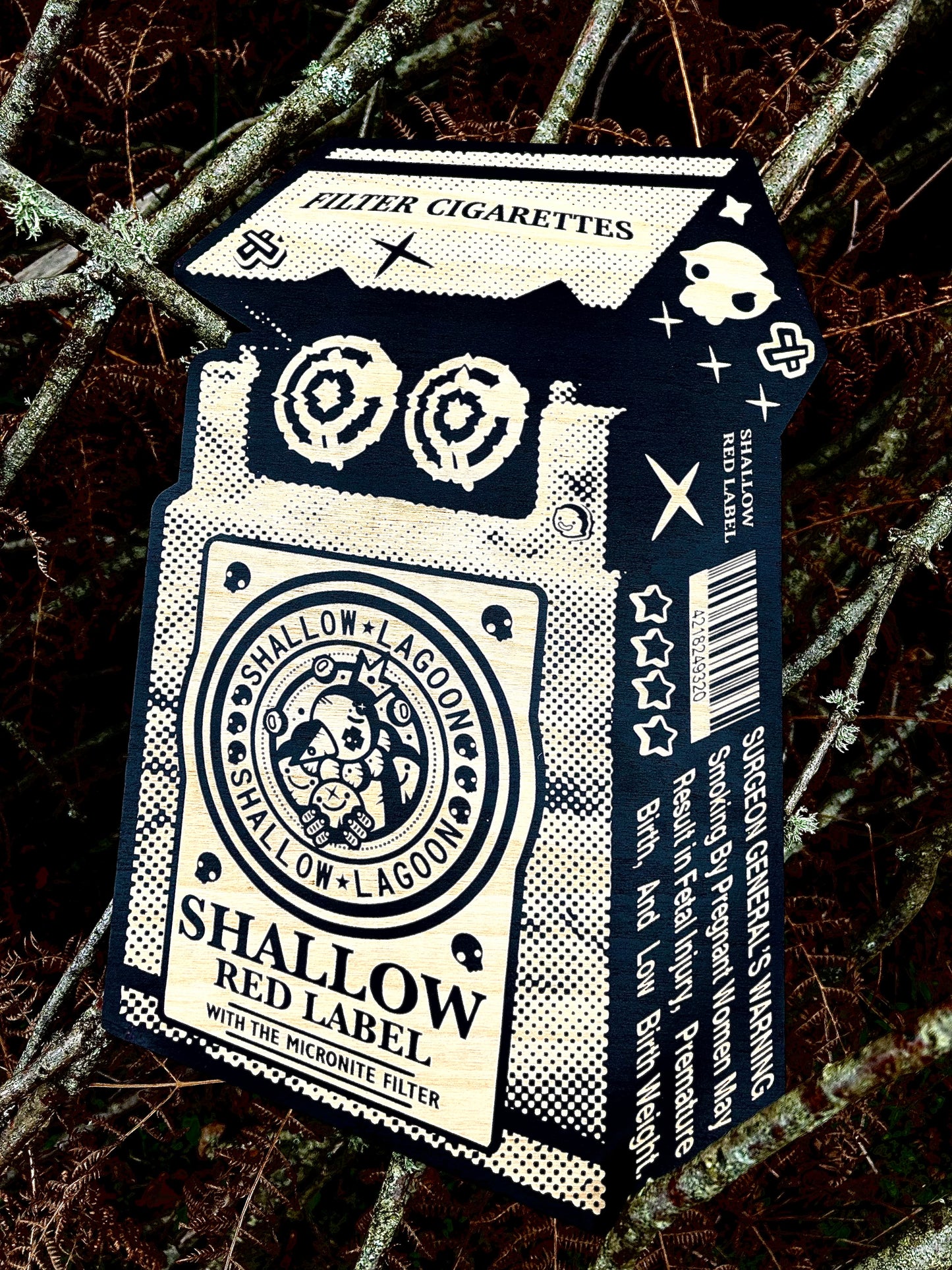 Bold graphic art piece designed as a "Shallow Red Label" cigarette pack with black and white halftone patterns, available at HEADS Art Gallery.