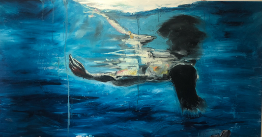 Artistic underwater scene with a person using abstract techniques.