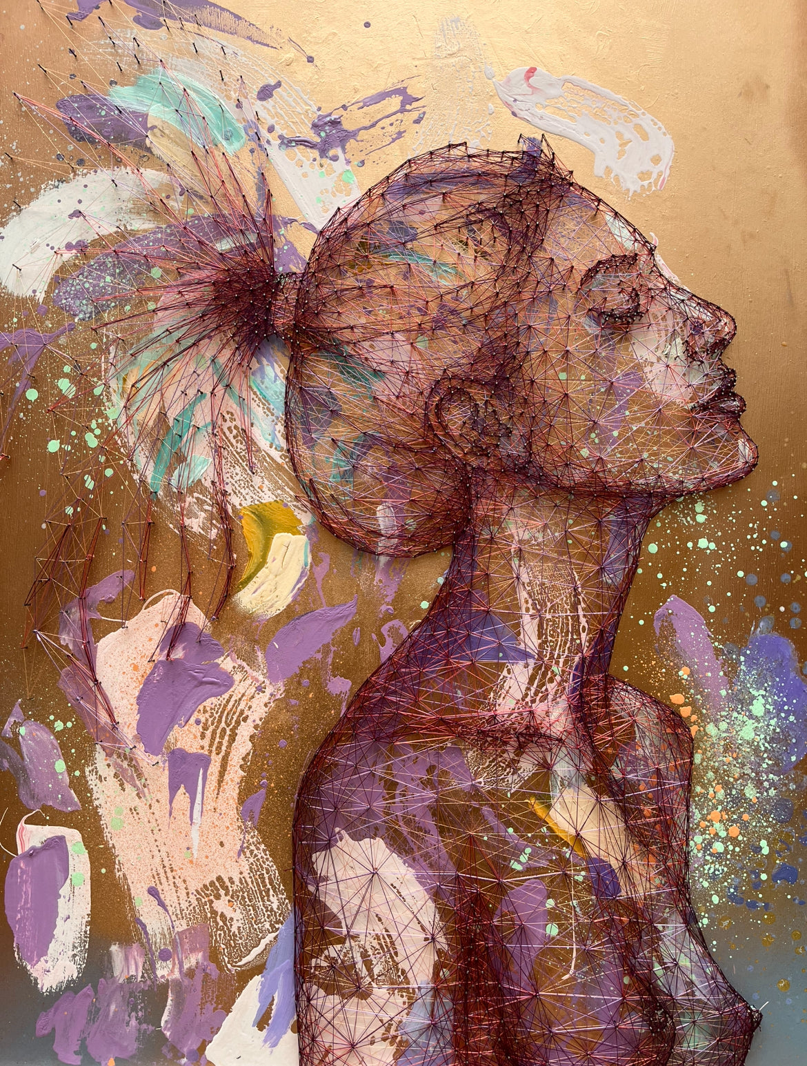 Artistic depiction of a woman with abstract elements on a gold background